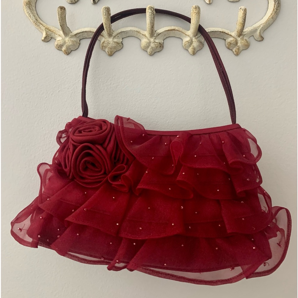 Inge Christopher ruffled cocktail handbag. Deep red with rose accent.